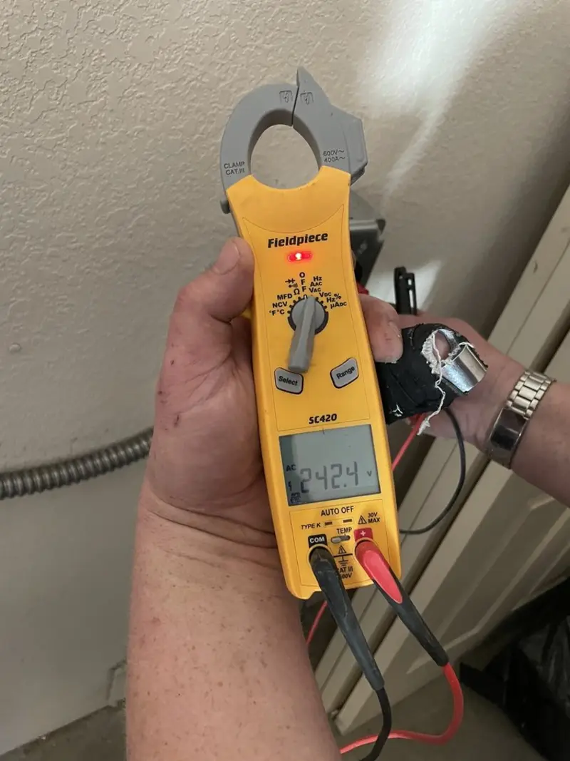 Voltage testing with clamp meter during Aluminum Wiring Replacement in Warren